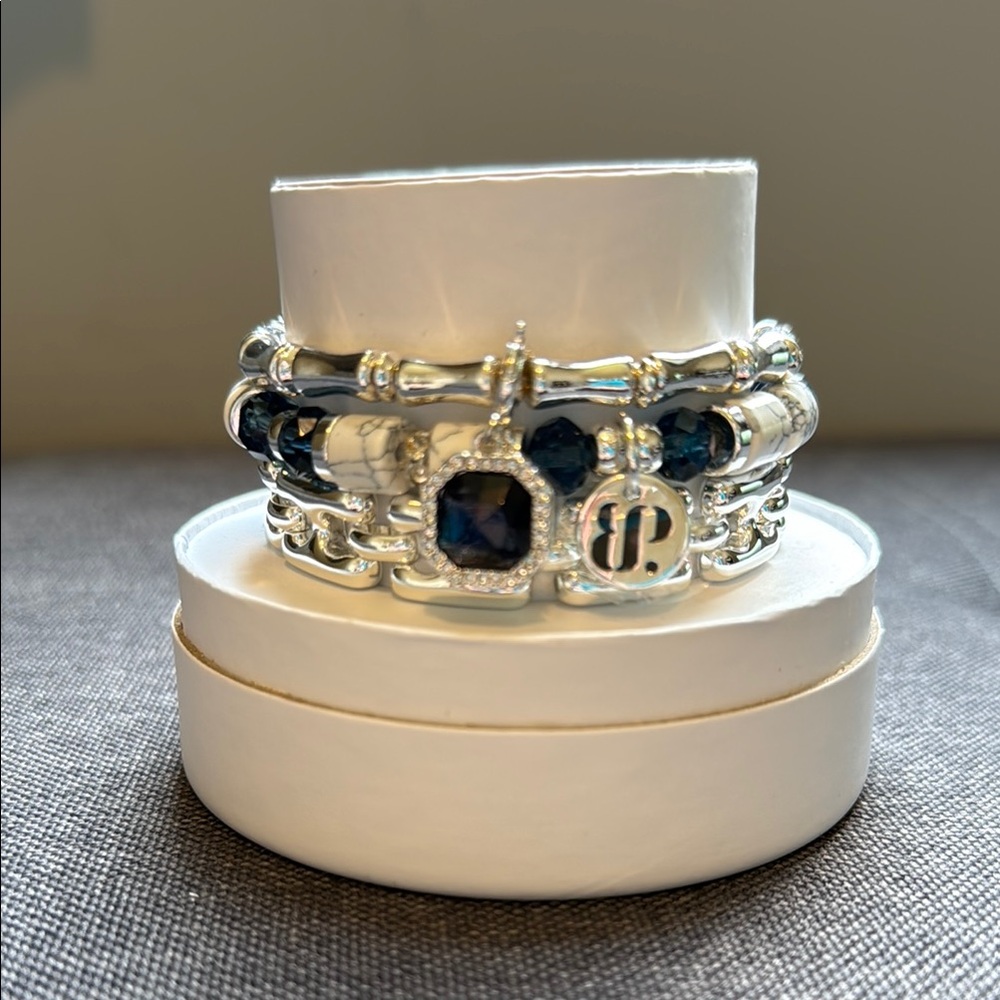 Elegant Silver Bracelet with Deep Blue Charms